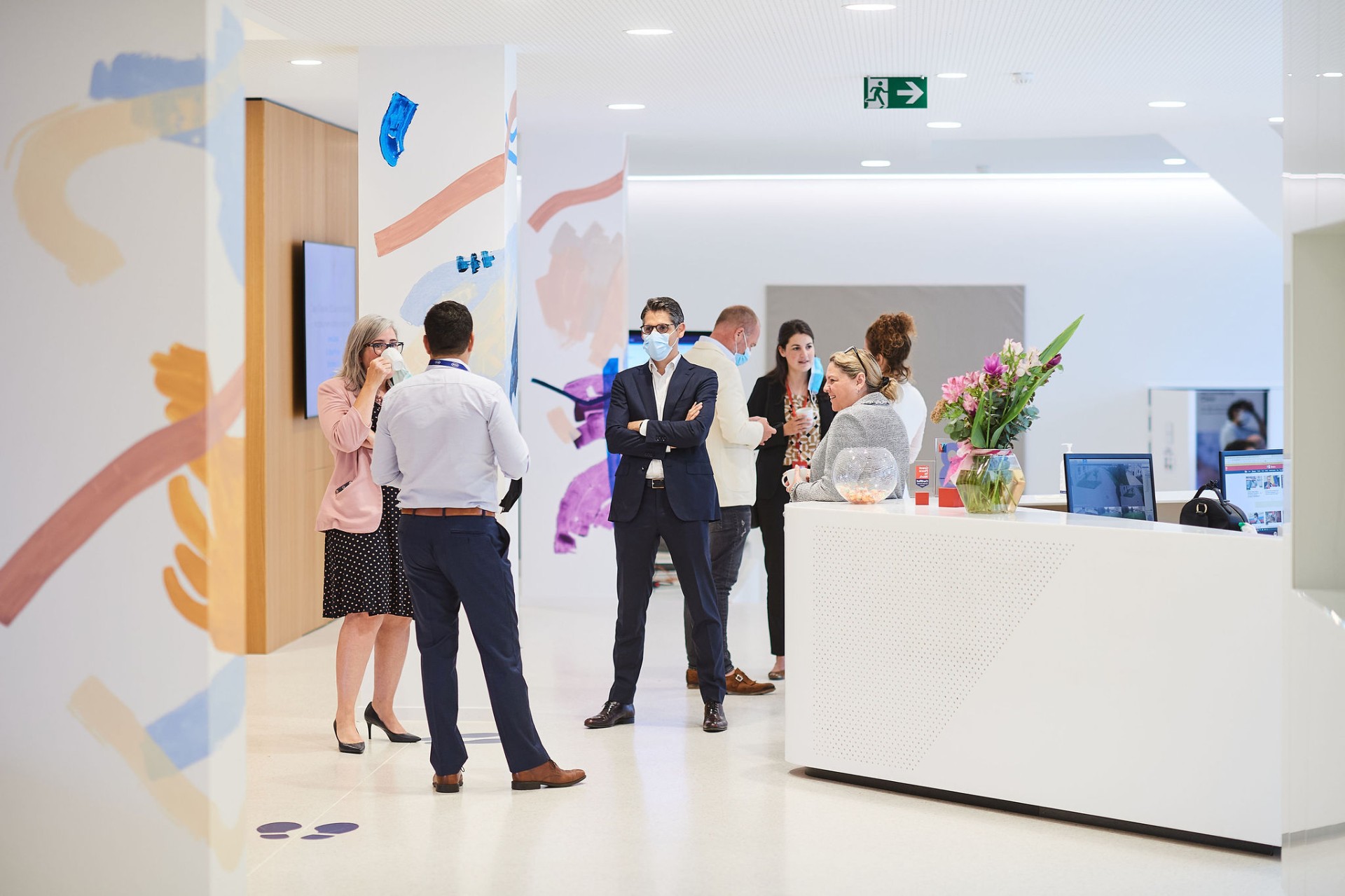 Roche Diagnostics reception area with ARTKOM painted intervention on the walls.